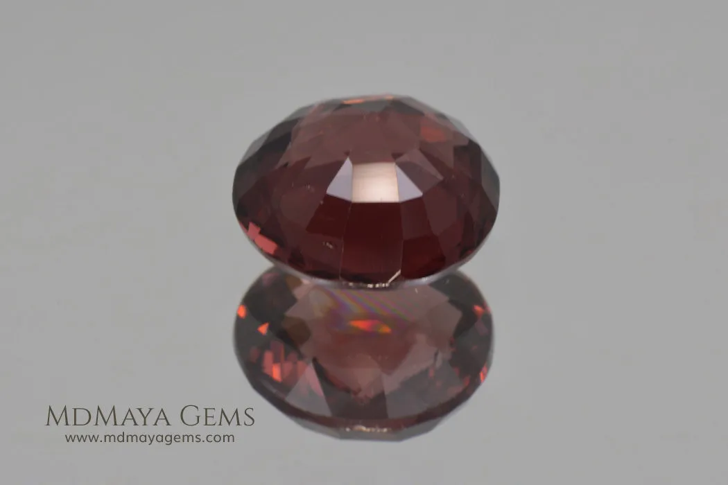 Exquisite! Natural reddish Orange Spinel. Round Cut. 2.23 ct.